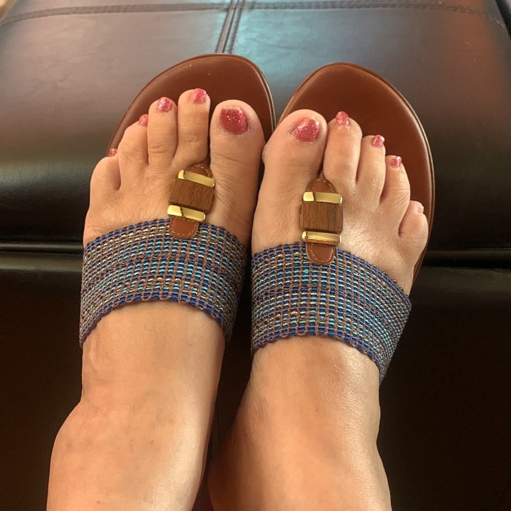 Blue woven sandals with brown trim